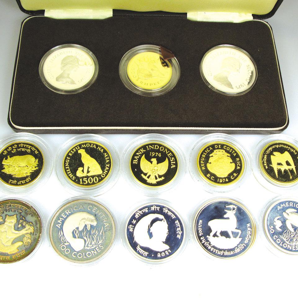 12 various silver and 6 various gold collector’s coins from various countries