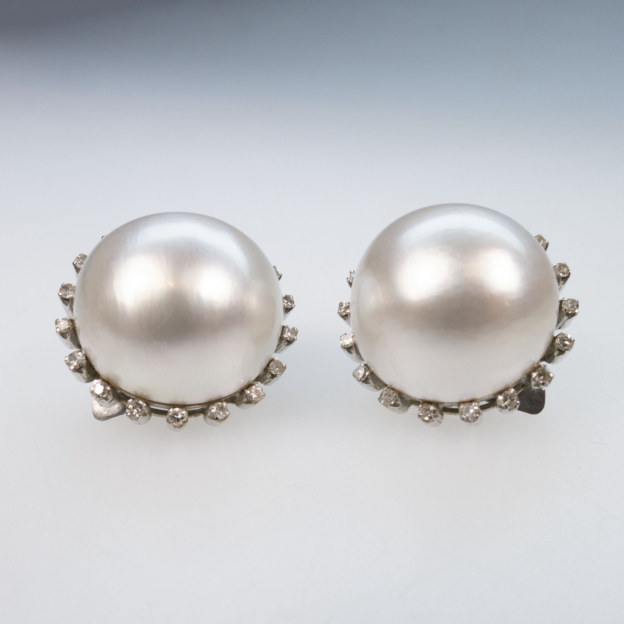 Pair Of Silver Clip-Back Button Earrings
