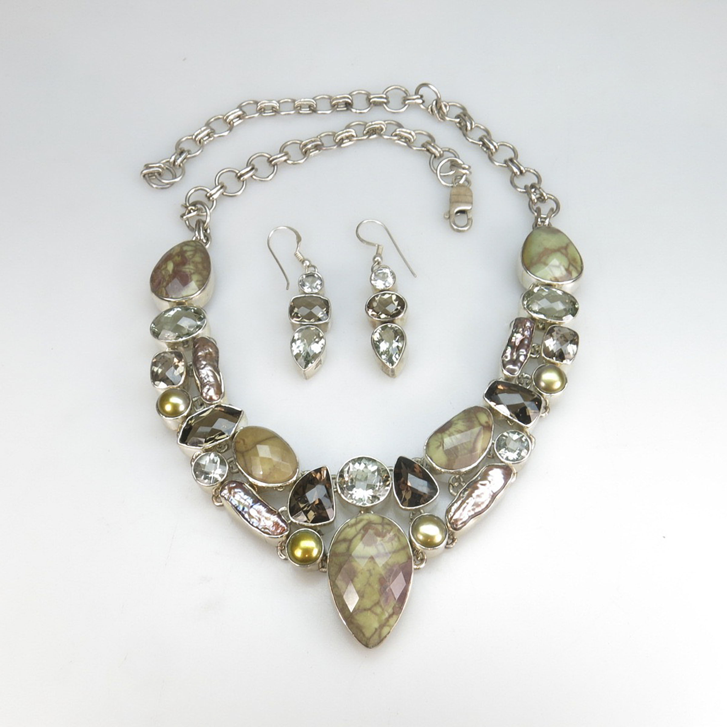Sterling Silver Necklace And A Pair Of Matching Drop Earrings