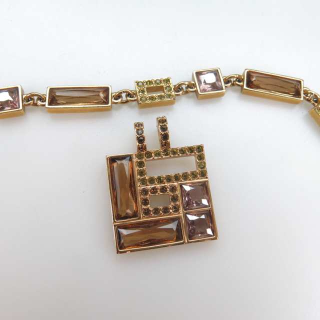 Swarovski Gold Tone Metal Bracelet And Pendant