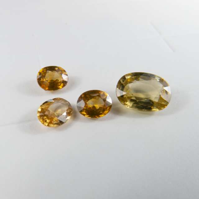 9 Various Cut Blue And Gold Zircons