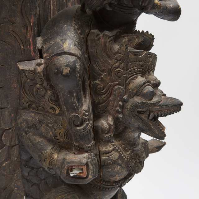 A Balinese Wood Carved Sculpture of Vishnu Riding Garuda, 19th/Early 20th Century