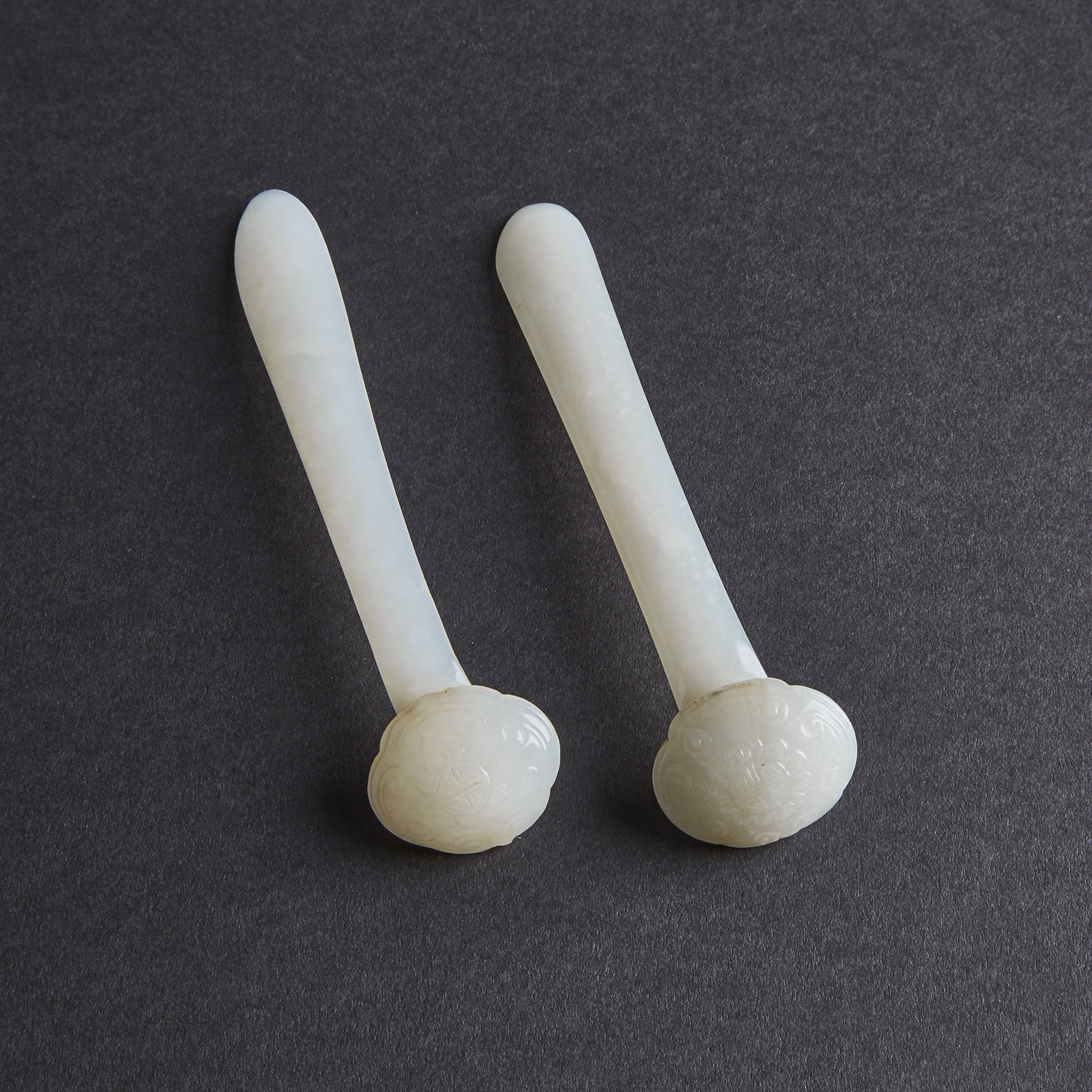 A Pair of Carved White Jade Ruyi-Shaped Hairpins, Qing Dynasty