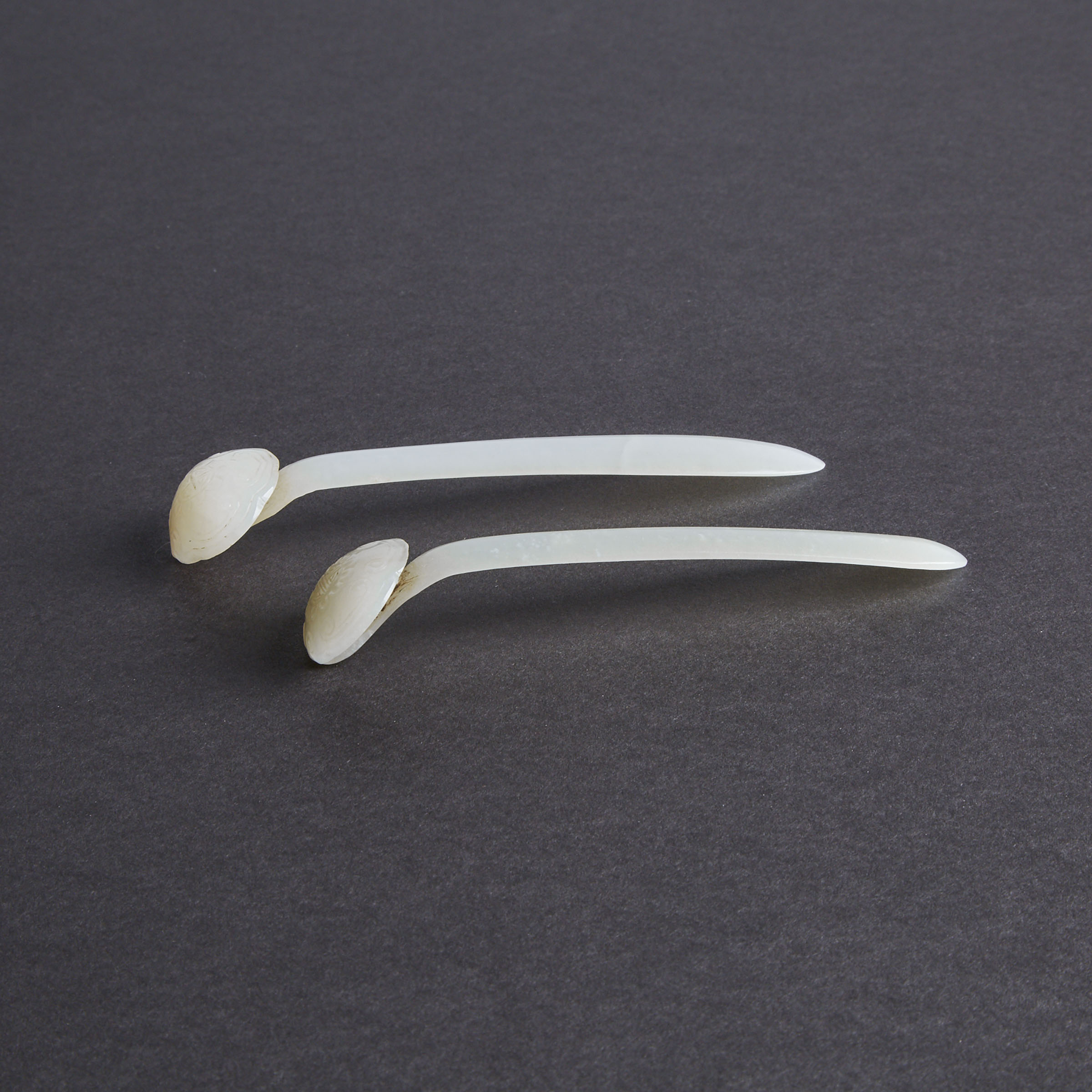 A Pair of Carved White Jade Ruyi-Shaped Hairpins, Qing Dynasty