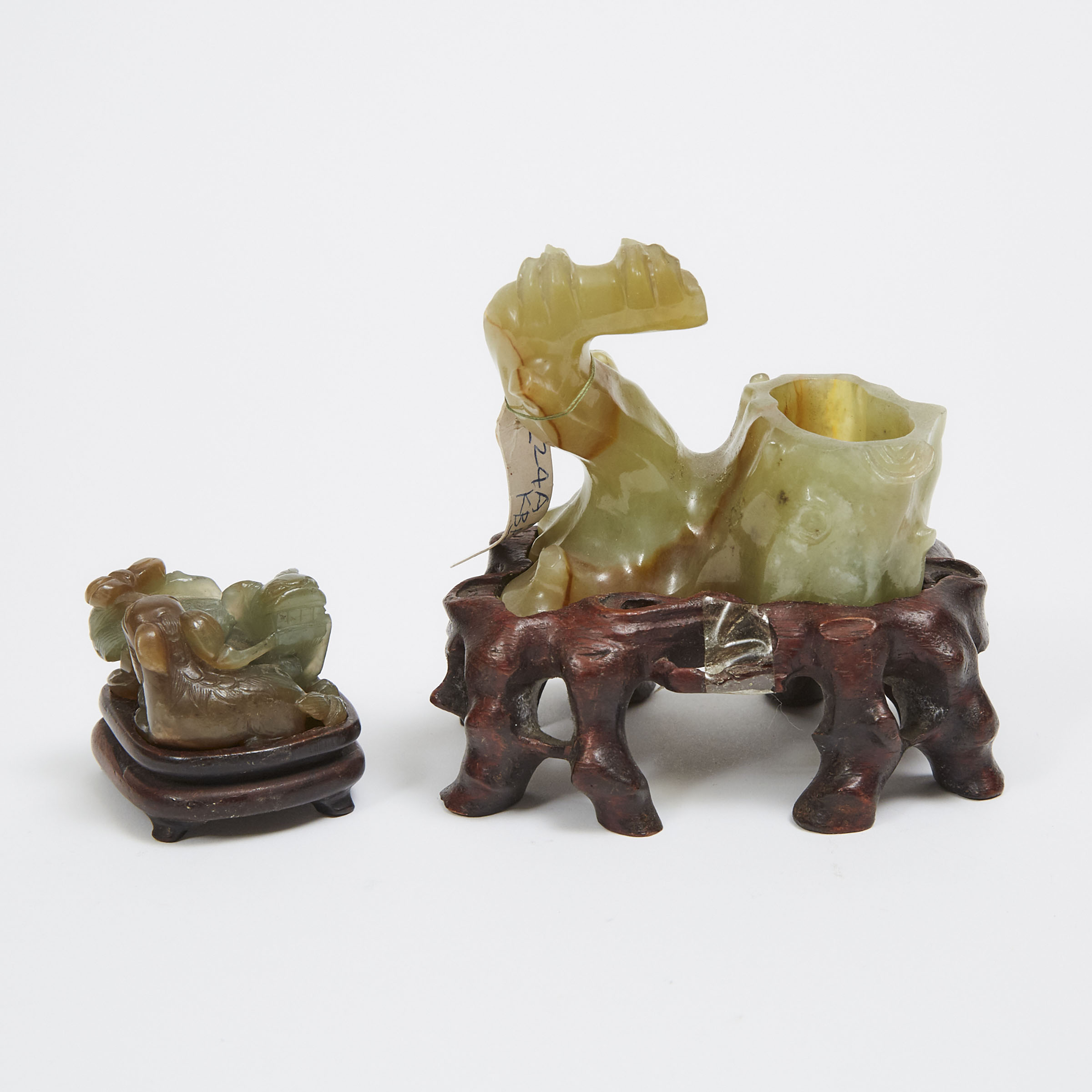 A Jade Trunk-Form Inkwell and a Jade Carving of Two Lions, Qing Dynasty