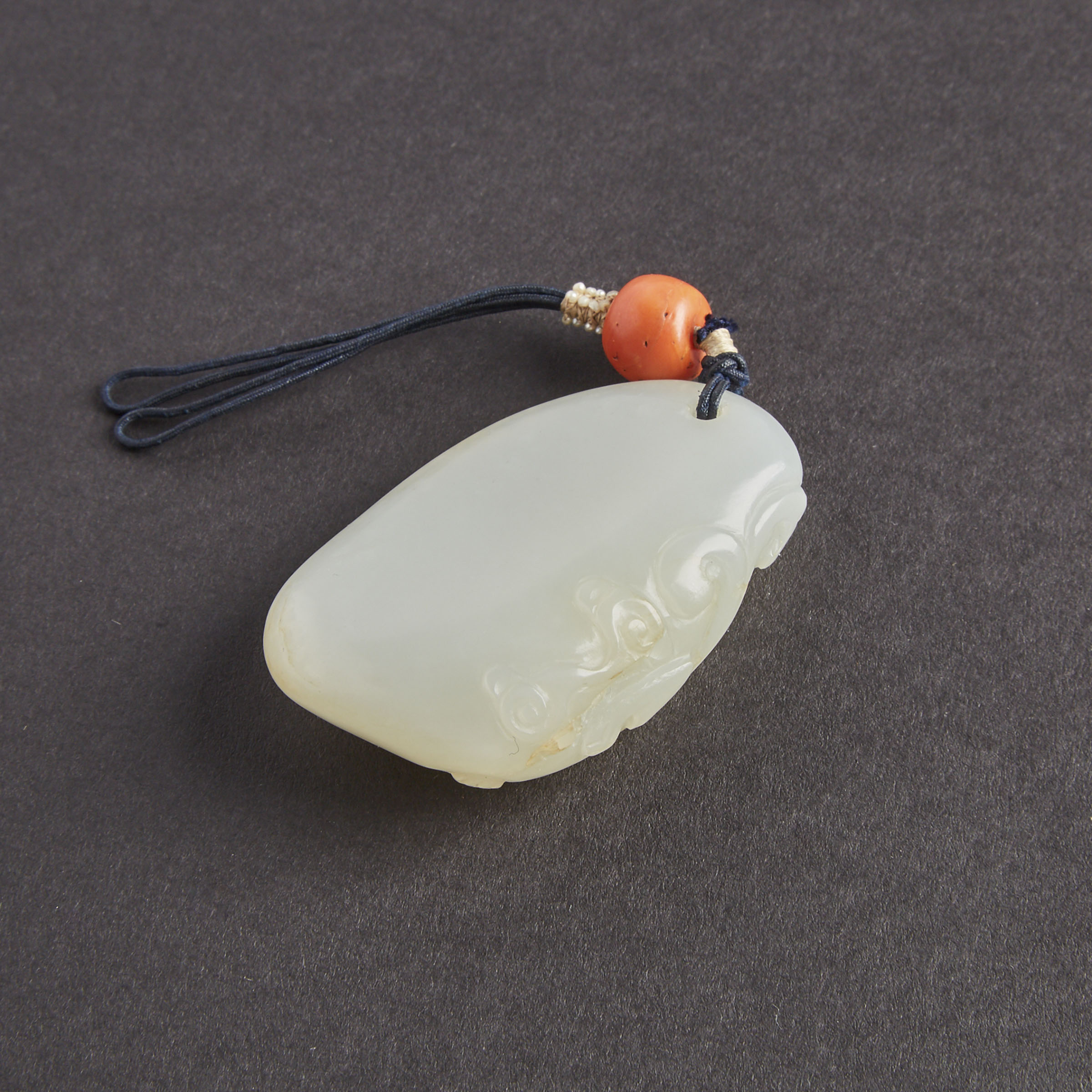 A White Jade Carved 'Chilong' Pebble, Qing Dynasty