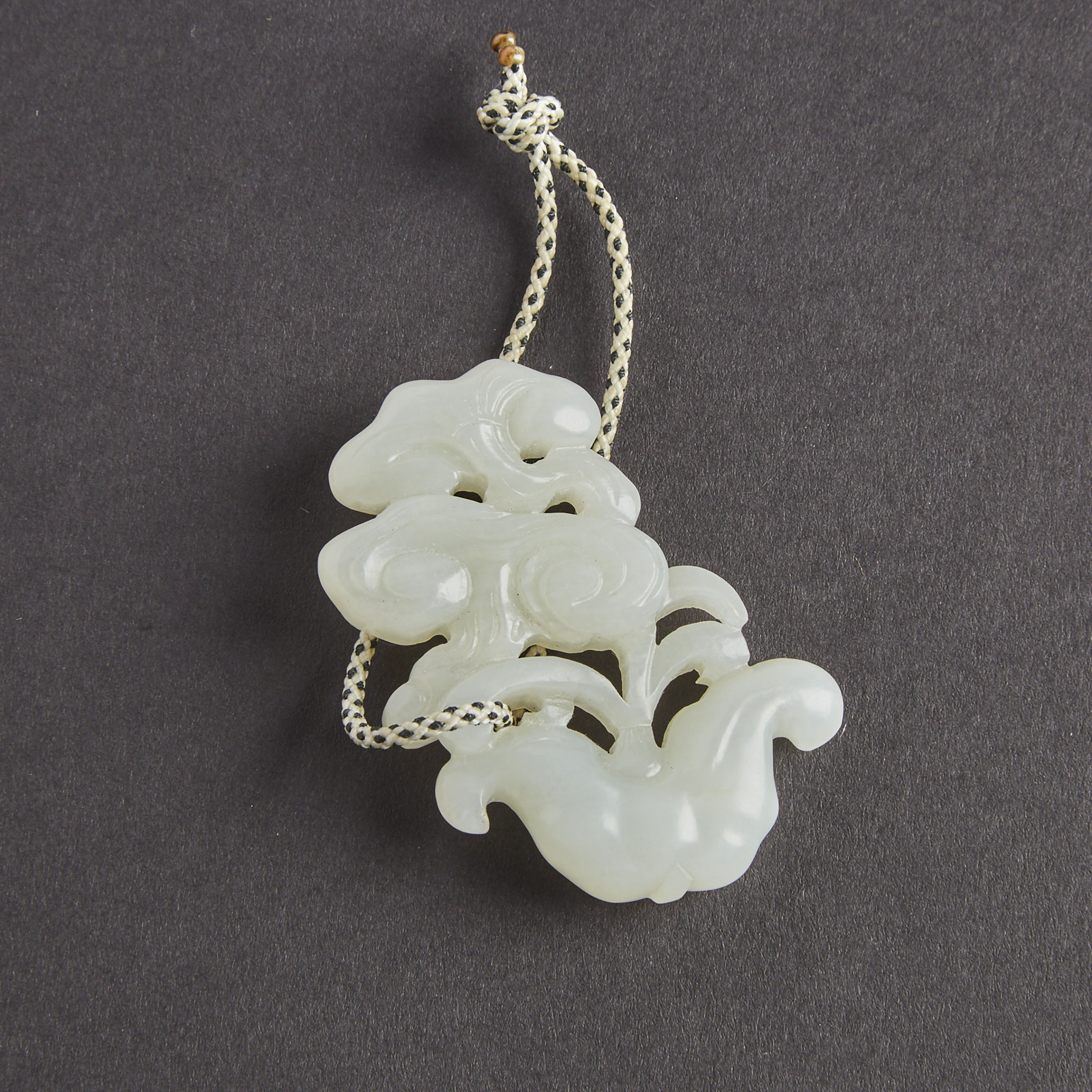 A White Jade Carving of a Lingzhi and Water Caltrop Group, Qing Dynasty