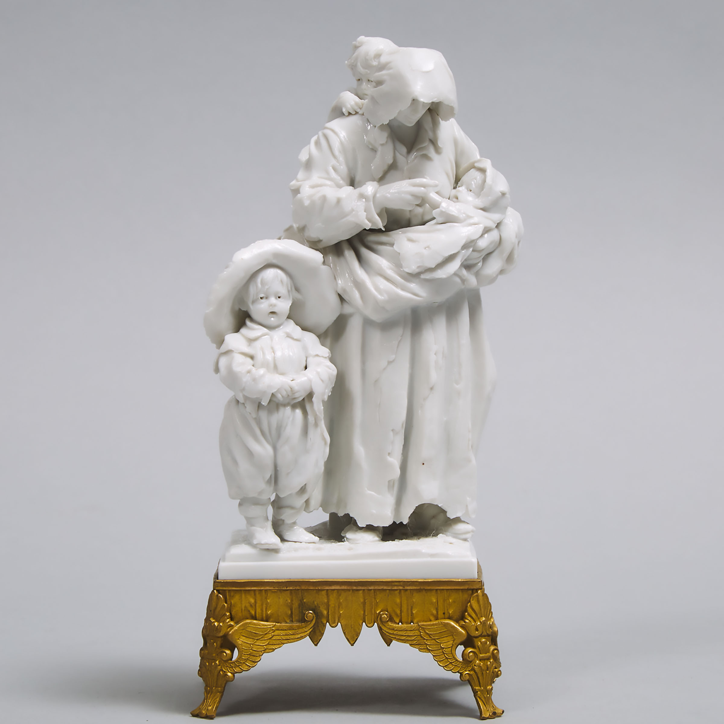 'Sèvres' White Glazed Figure Group of a Mother and Children, late 19th century
