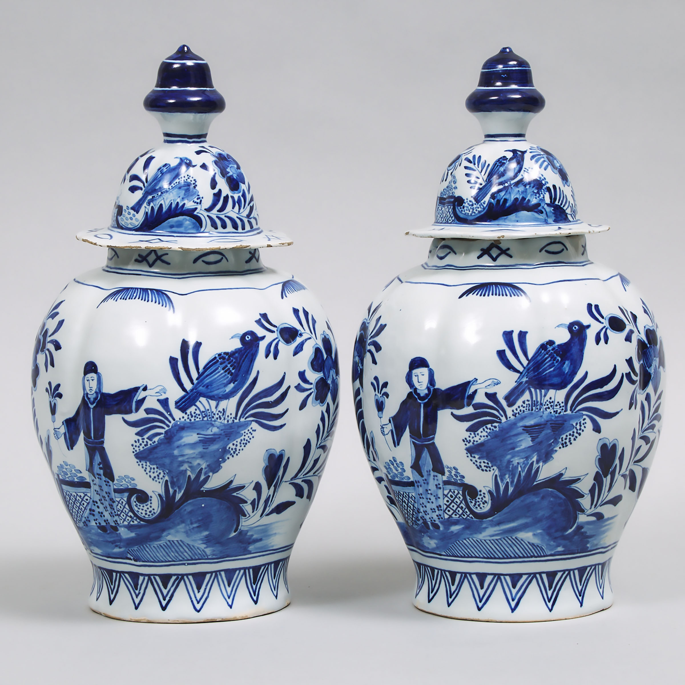 Pair of Delft Blue Painted Lobed Baluster Vases and Covers, late 18th/19th century