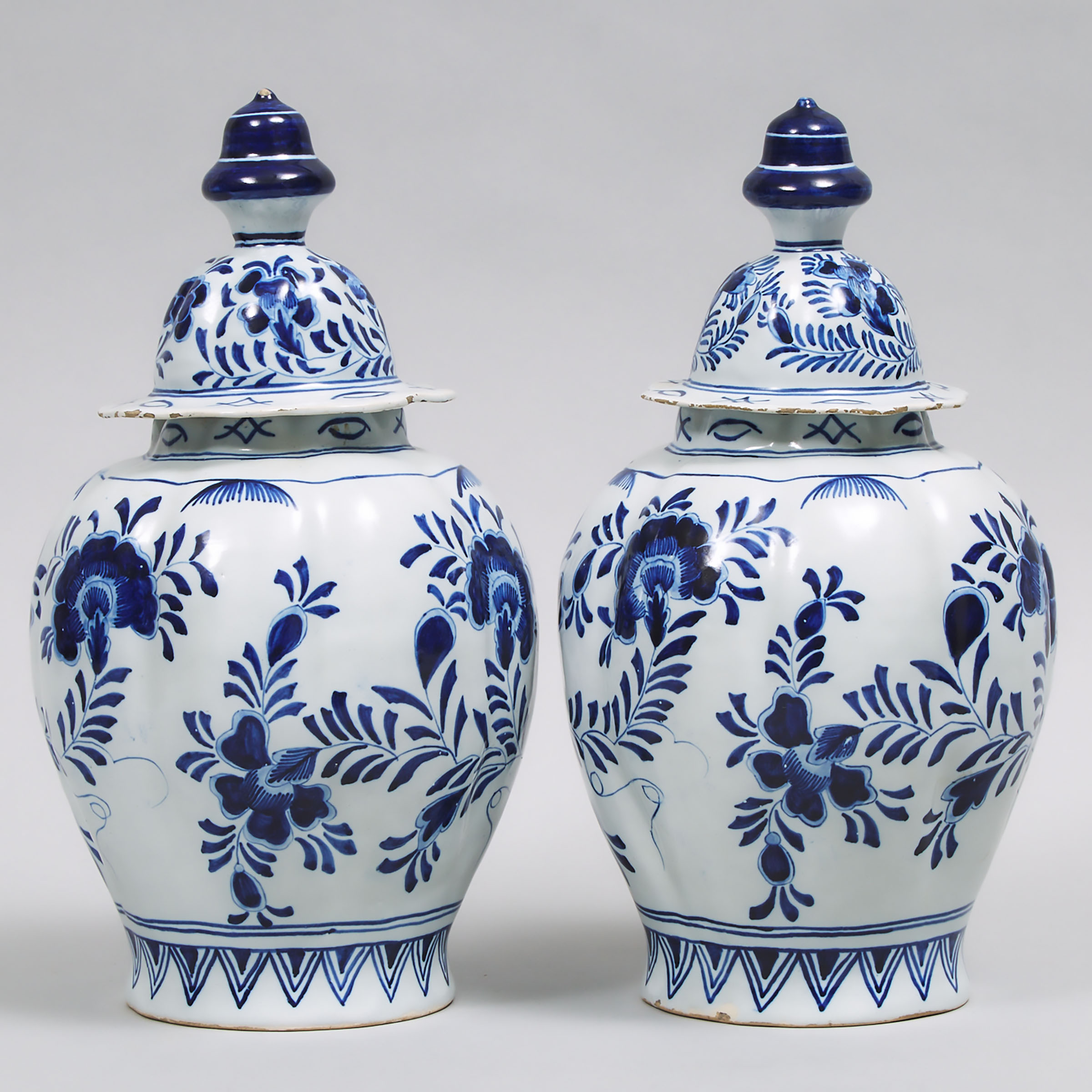 Pair of Delft Blue Painted Lobed Baluster Vases and Covers, late 18th/19th century