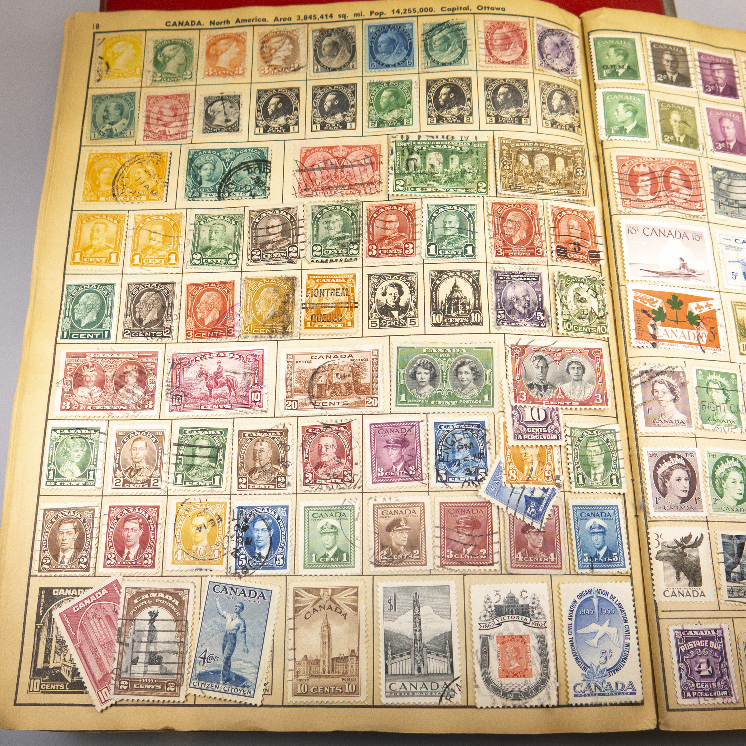 2 Albums Containing a Collection Of World Stamps