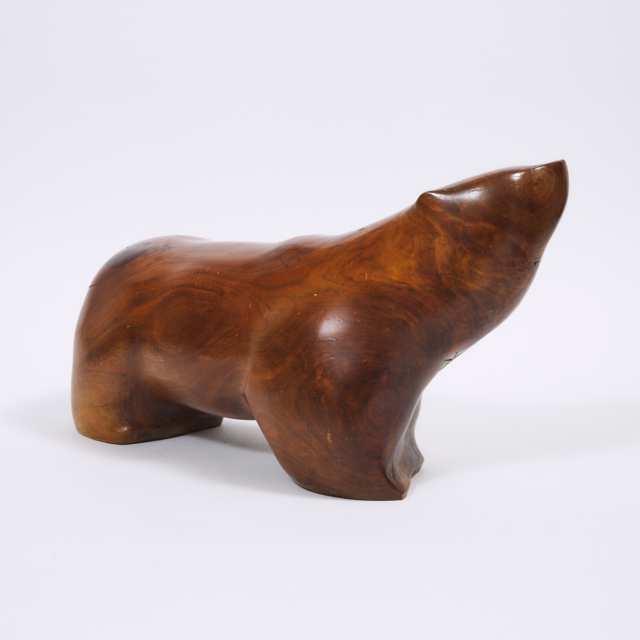 Canadian School Carved Walnut Model of a Standing Bear, late 20th century