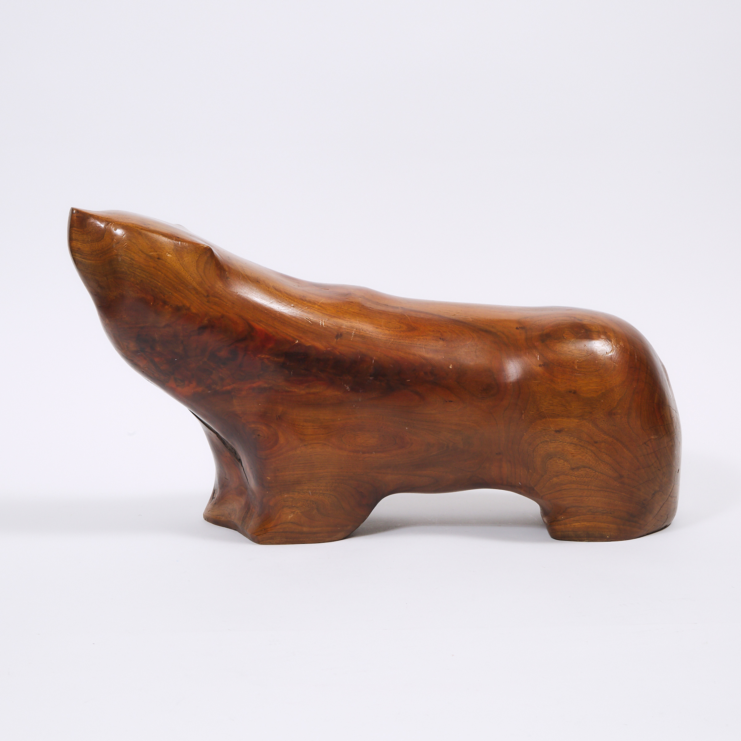 Canadian School Carved Walnut Model of a Standing Bear, late 20th century