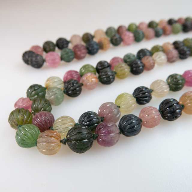 Single Strand Of Various Coloured Carved Tourmaline Beads
