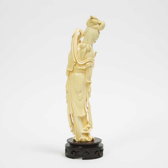 An Ivory Figure of a Lady Holding a Peony Flower, Republican Period