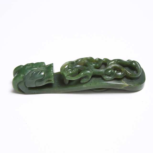 A Spinach Jade 'Dragon' Belt Hook, Qing Dynasty
