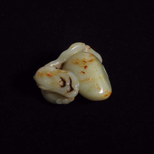 A Celadon and Russet Jade 'Sanduo' Carving