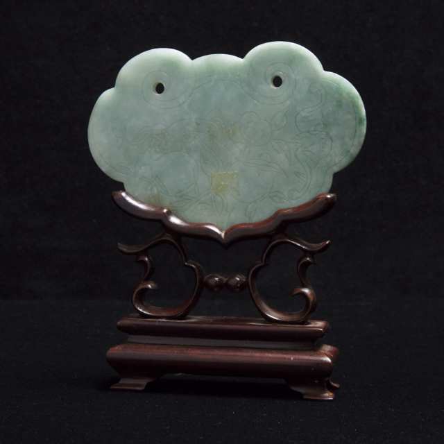 A Jadeite Ruyi Head Lock-Form Plaque with Stand, Qing Dynasty