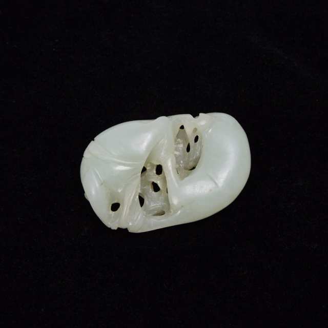 A White Jade Carving of Two Badgers, Qing Dynasty