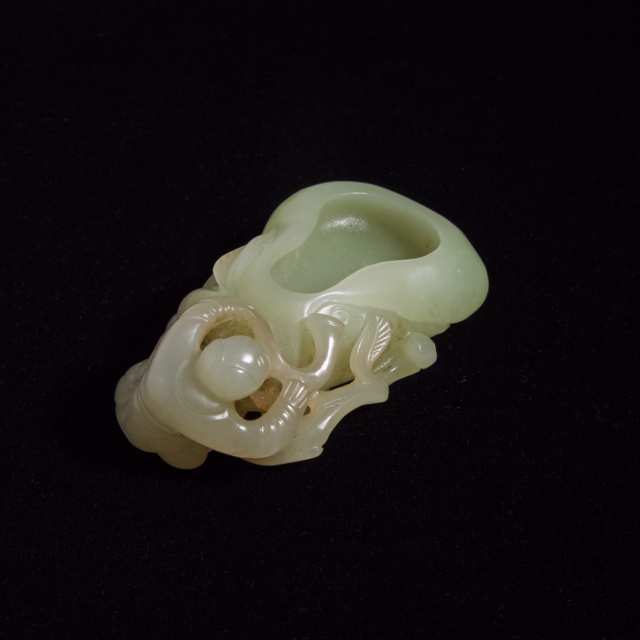 A Celadon Jade 'Double-Gourd and Boy' Washer