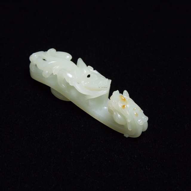 A White Jade Belt Hook with Russet Skin, Qing Dynasty