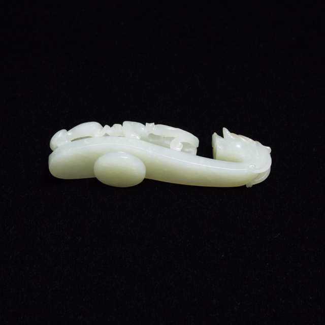 A White Jade Belt Hook with Russet Skin, Qing Dynasty