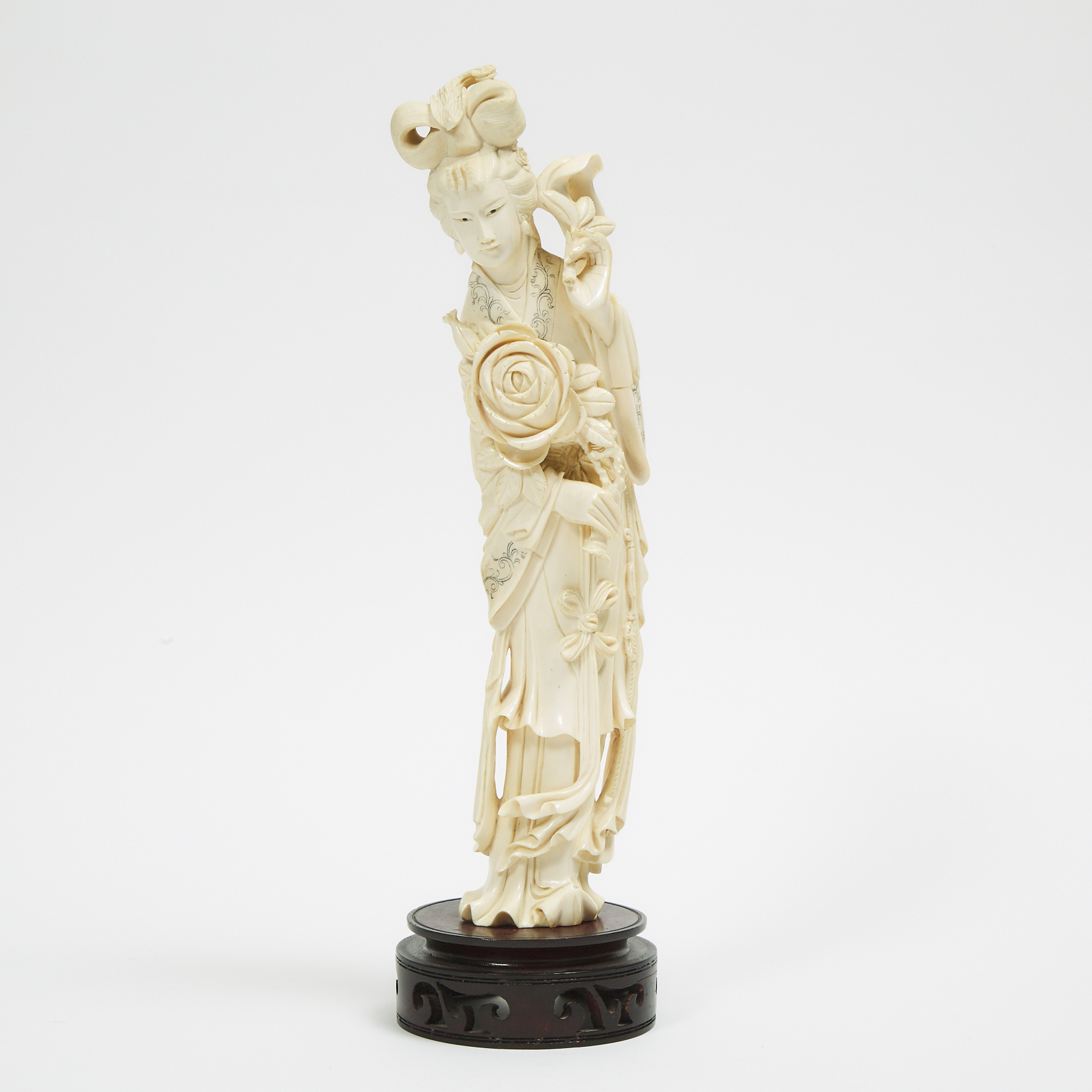 An Ivory Figure of a Lady Holding a Peony Flower, Republican Period