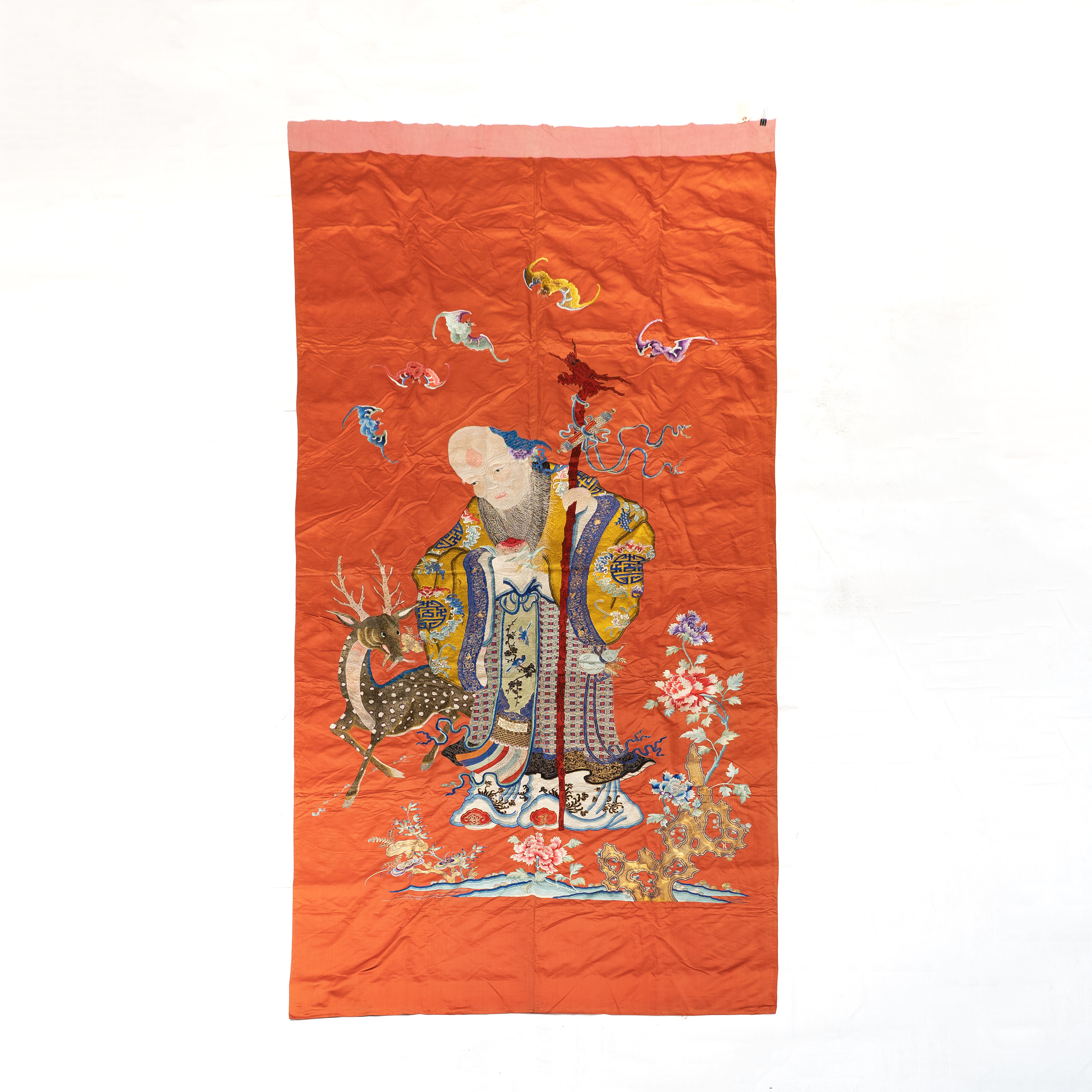 A Large Chinese Embroidered 'Shoulao' Red Silk Panel, Late Qing Dynasty