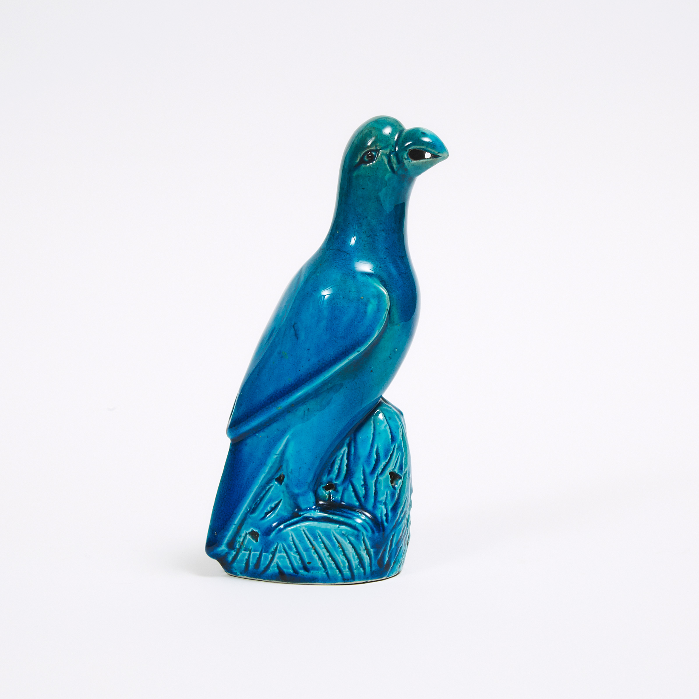 A Turquoise Glazed Porcelain Parrot, Qing Dynasty