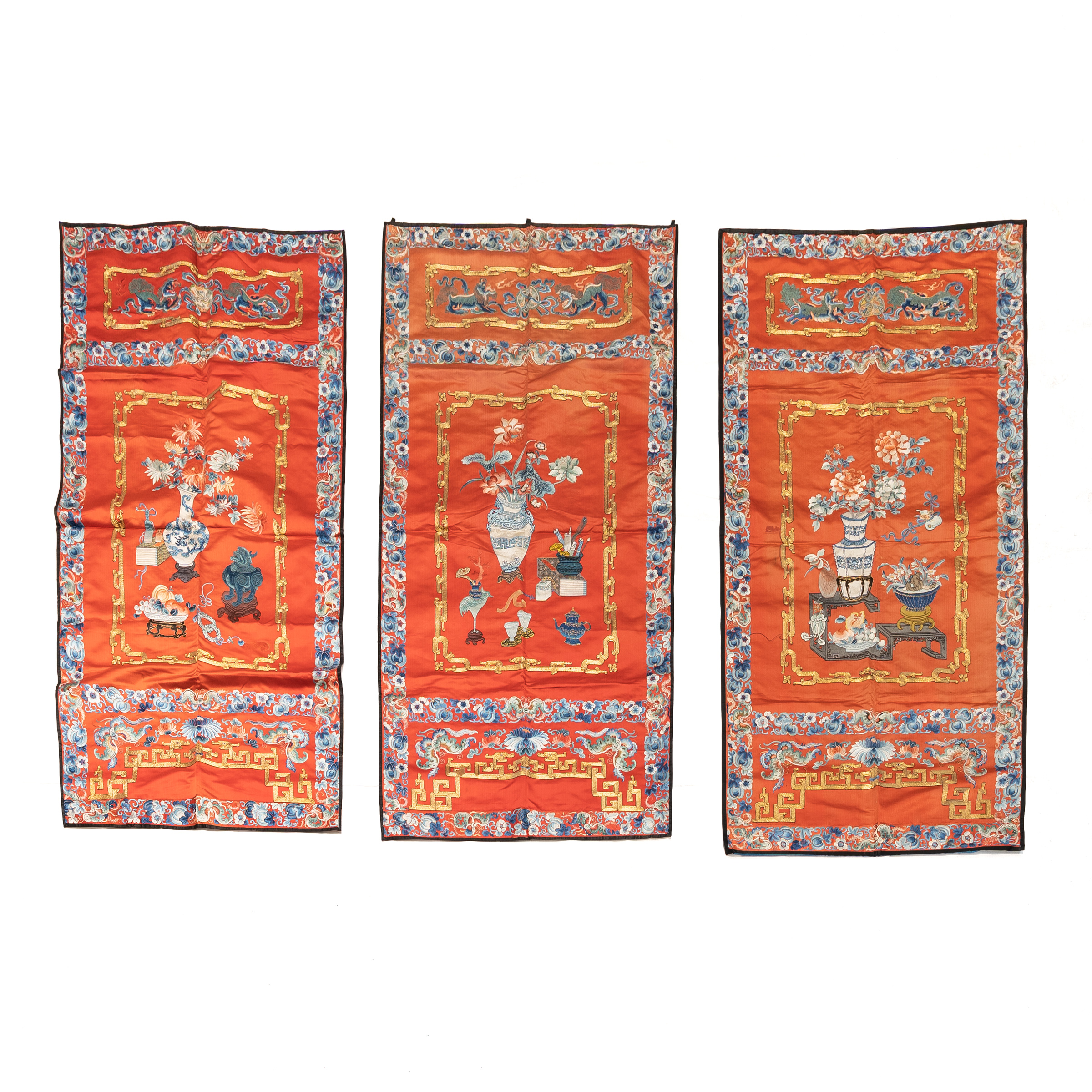 A Set of Three Chinese Embroidered 'Hundred Antiques' Red Silk Panels, Late Qing Dynasty