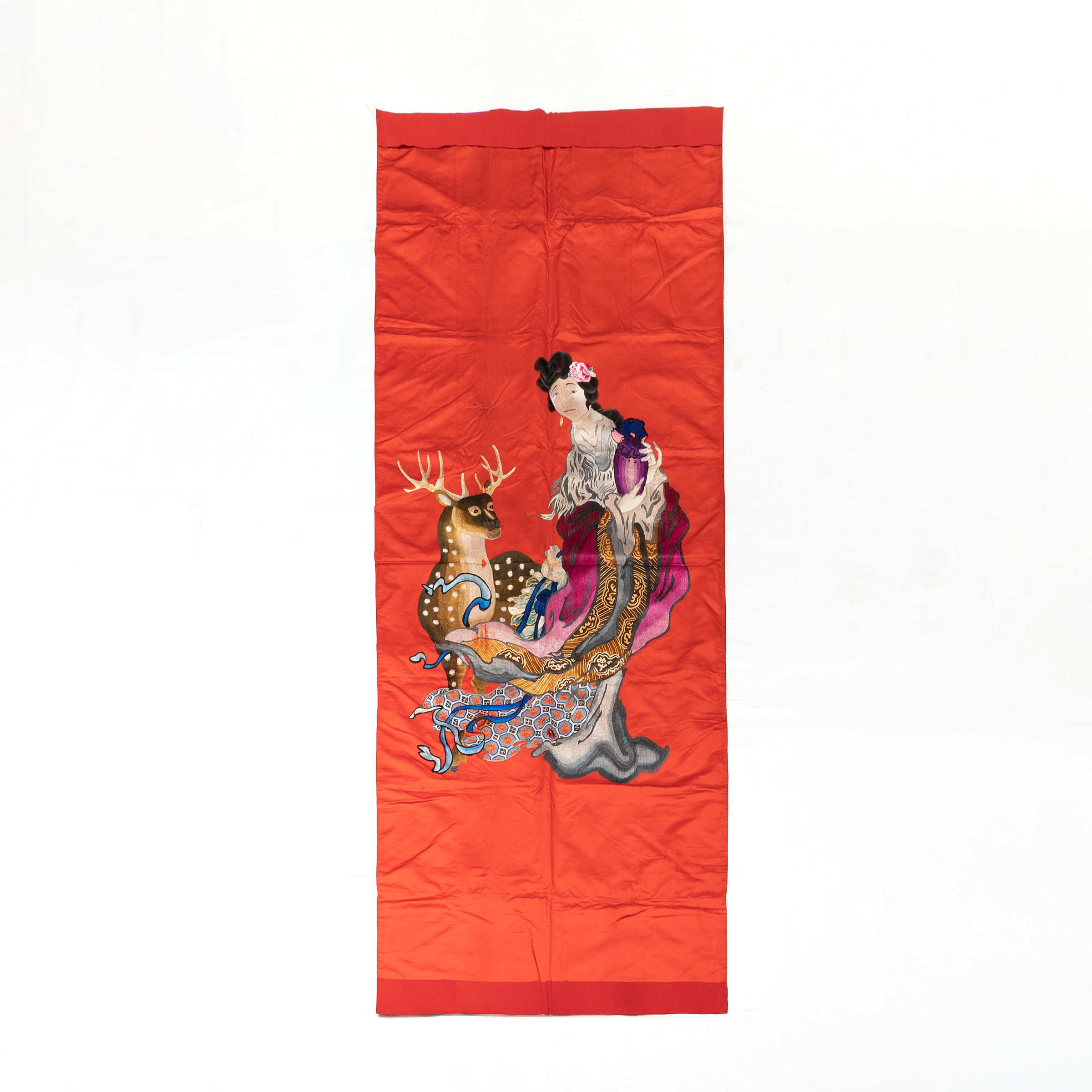 A Large Chinese Embroidered 'Magu and Deer' Red Silk Panel, Late Qing Dynasty