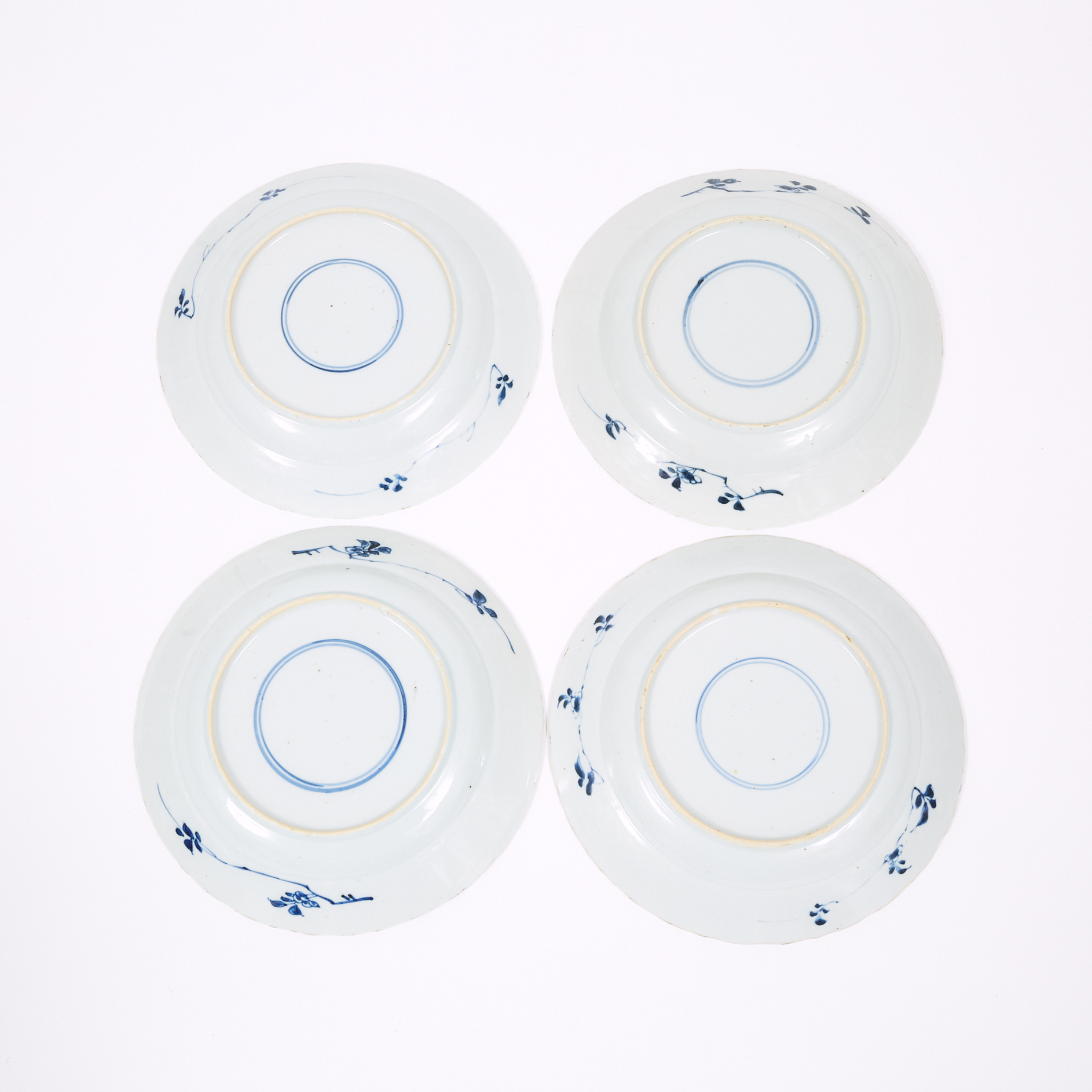 A Set of Four Blue and White Dishes with Floral Panels, 18th Century