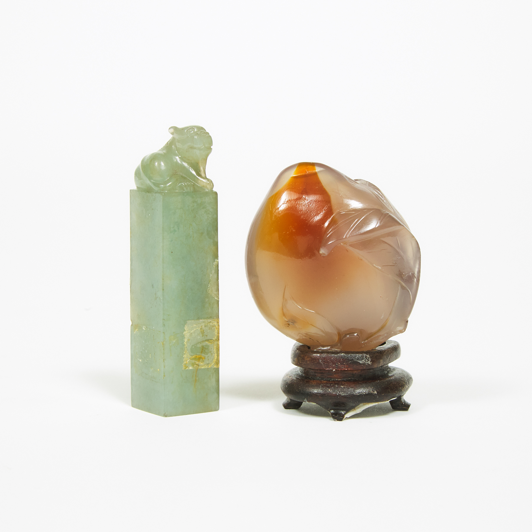 An Agate Carving of a Peach, together with Jadeite 'Mythical Beast' Seal, Qing Dynasty