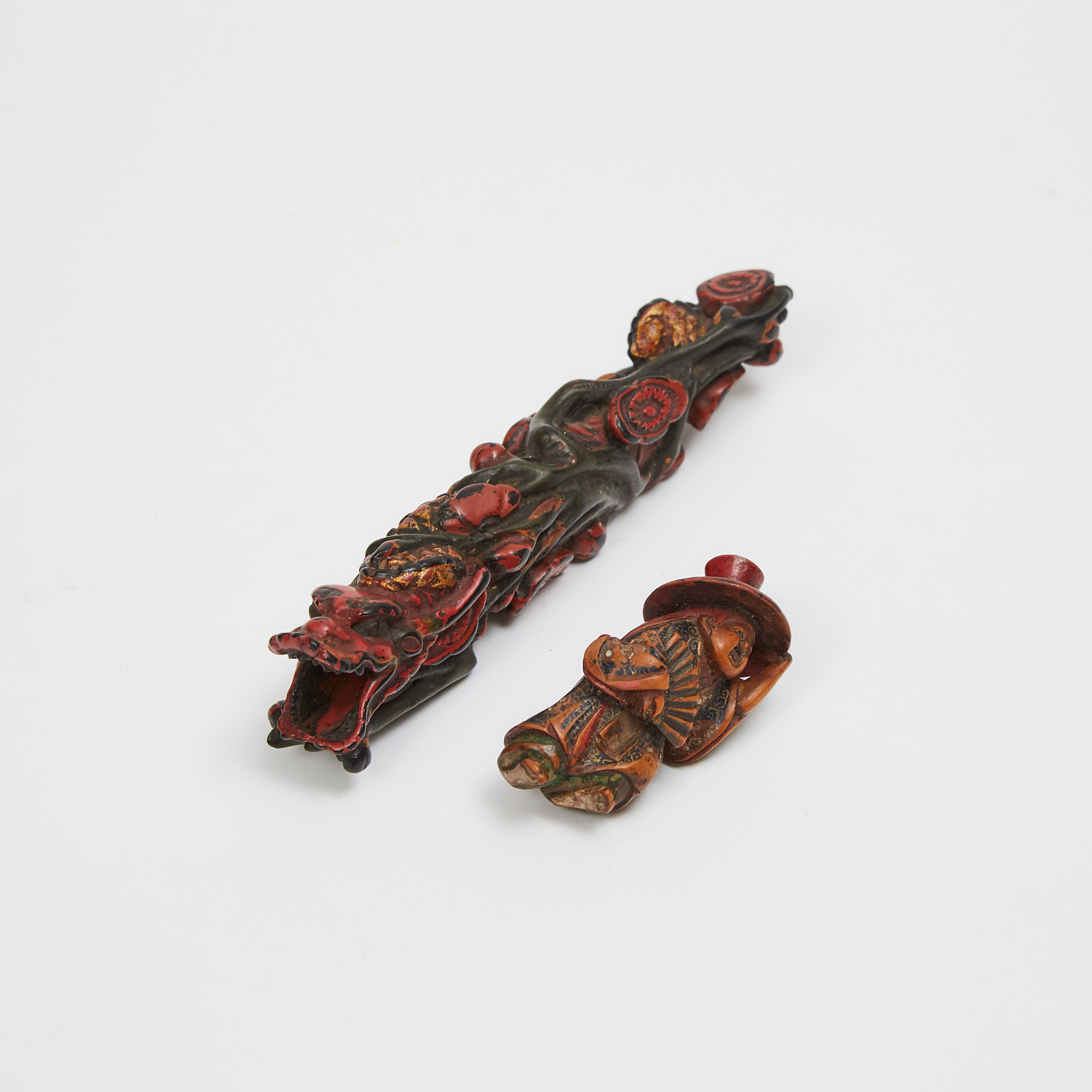 After Shuzan, A Painted Wood Netsuke of a Dragon, together with a Drunk Dancing Okame, 18th Century or Later