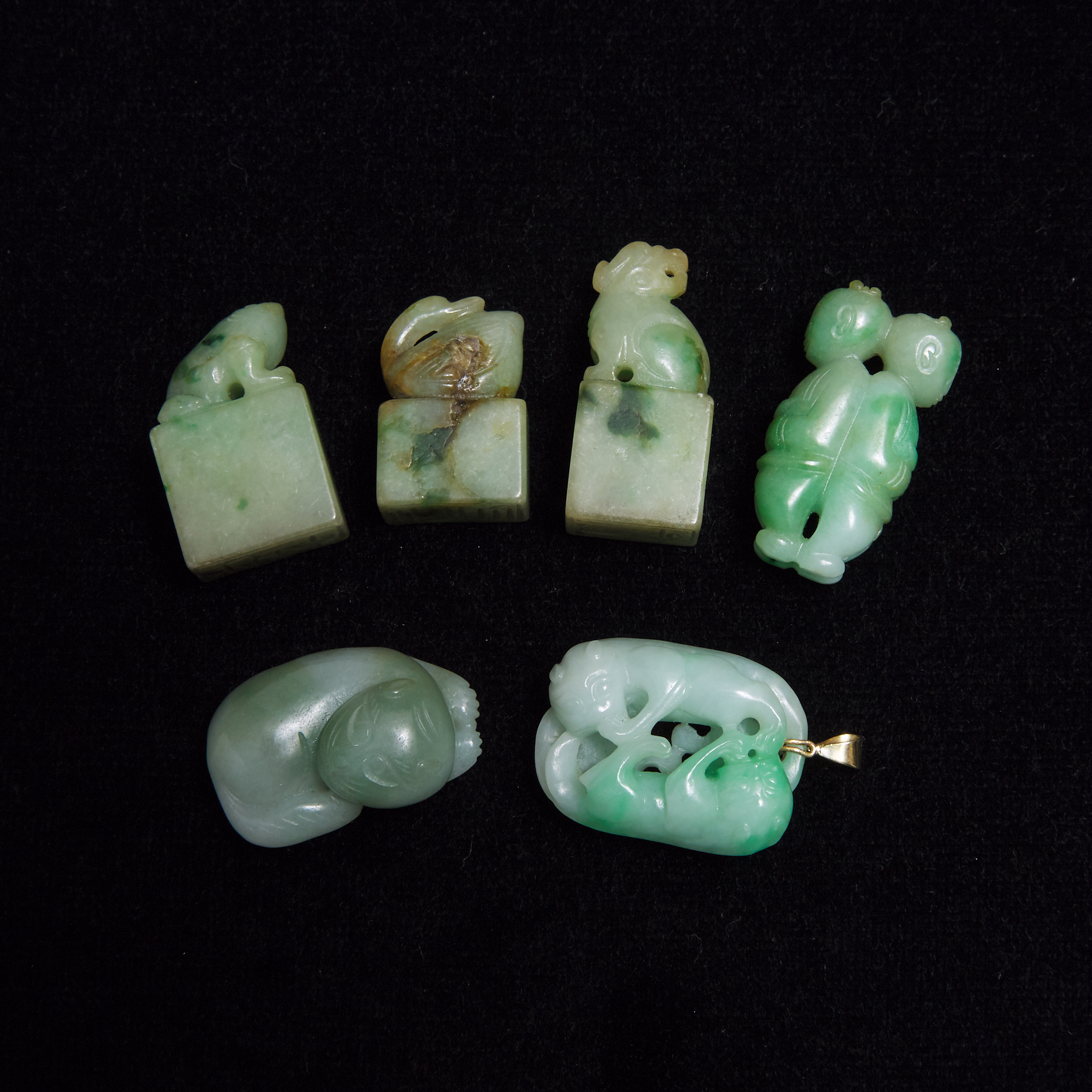 A Group of Six Jadeite Carvings 