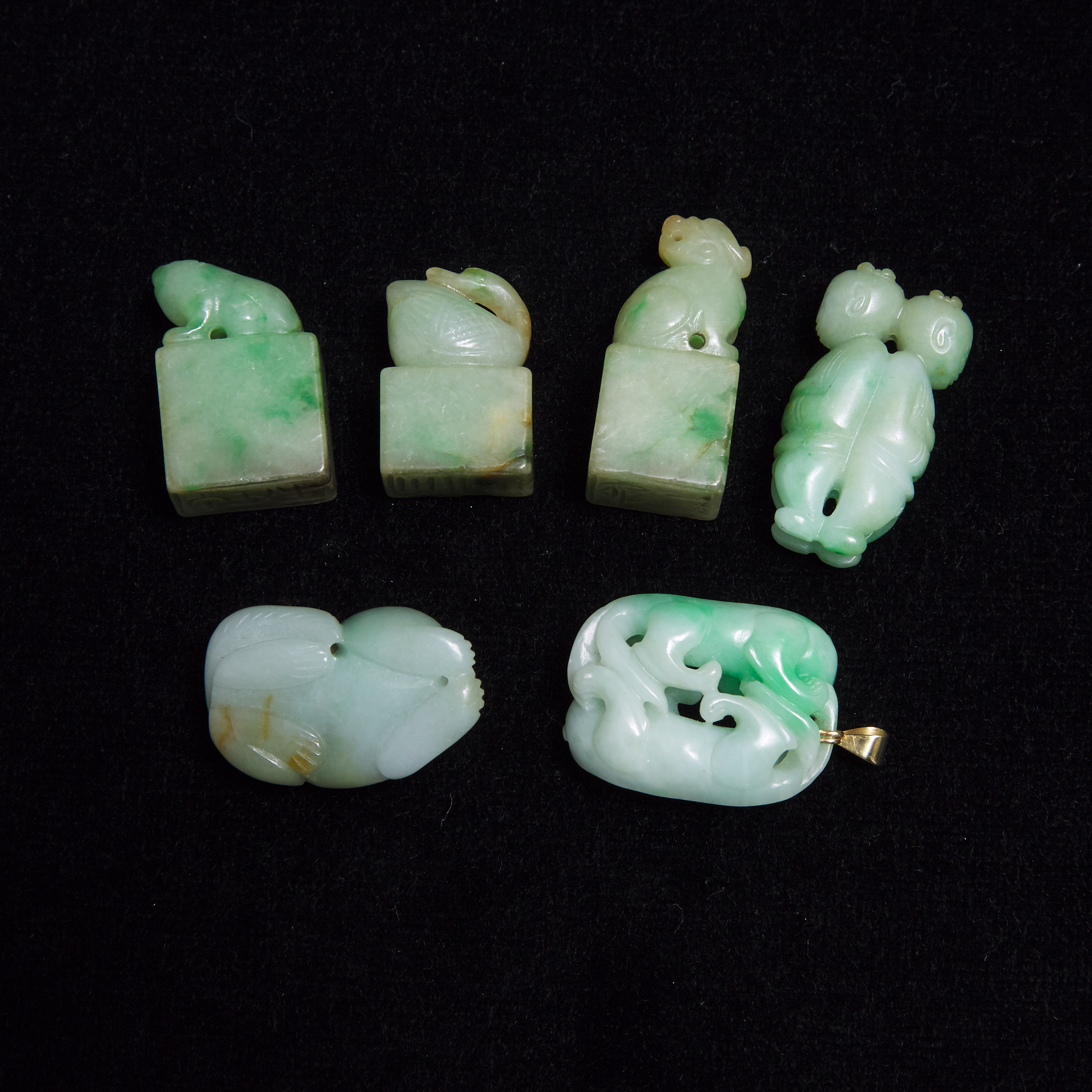 A Group of Six Jadeite Carvings 