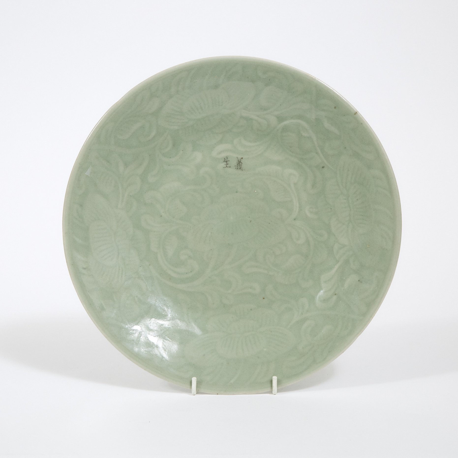 A Celadon Moulded Dish, Late Qing Dynasty