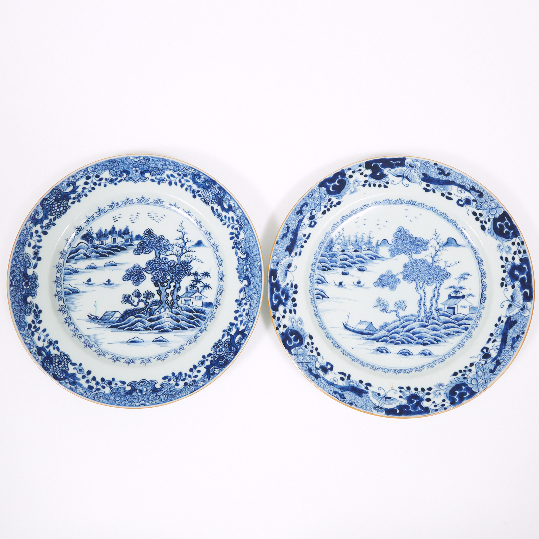 A Pair of Well-Painted Blue and White 'Landscape' Plates, 18th Century