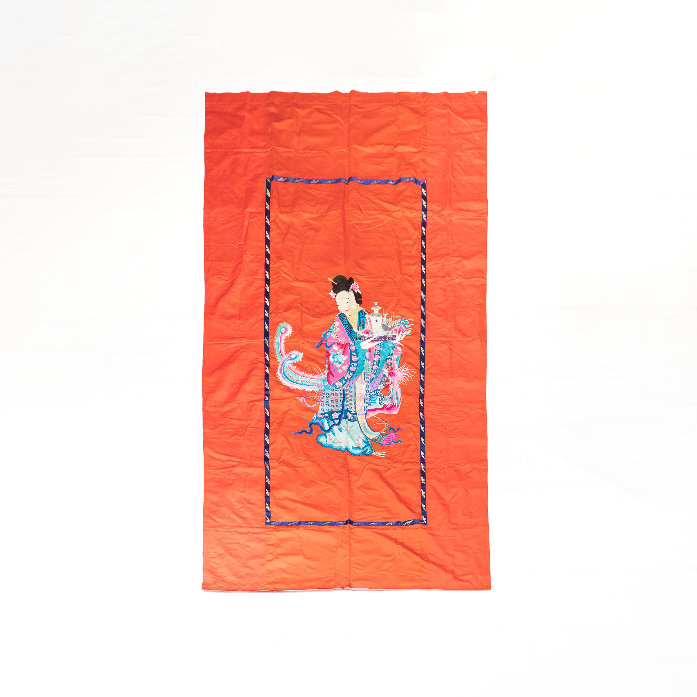 A Large Chinese Embroidered 'Lady and Phoenix' Red Silk Panel, Late Qing Dynasty