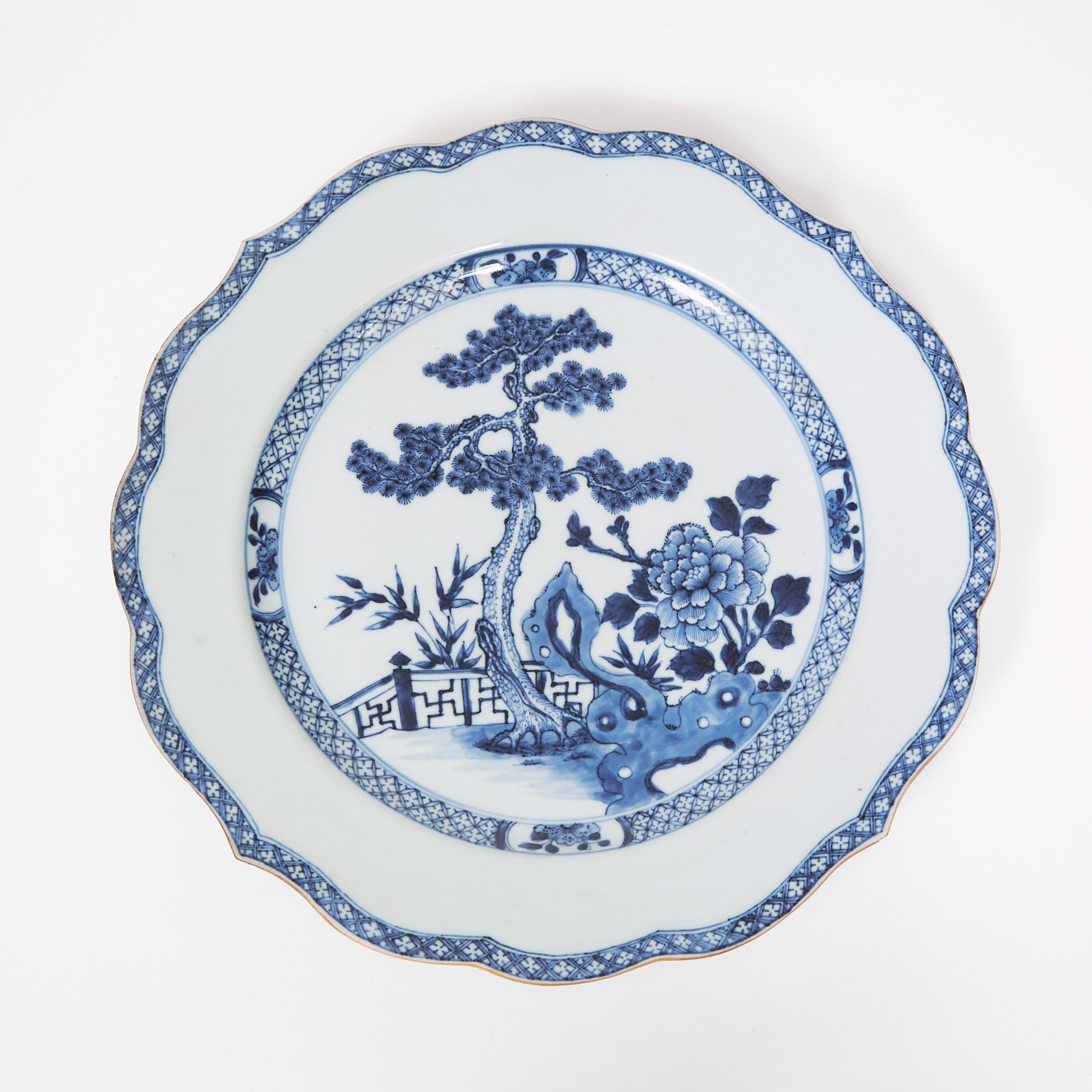 A Large Blue and White 'Pine Tree' Barbed-Rim Plate, 18th Century