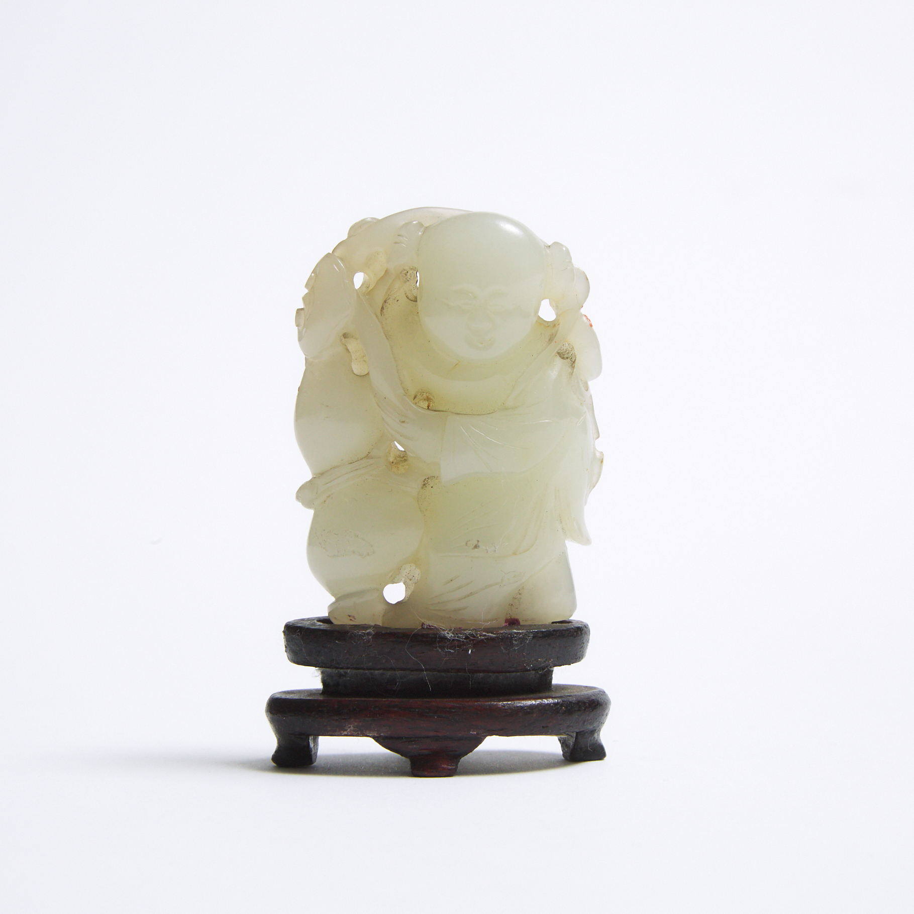 A Pale Celadon-White Jade Carving of a Boy with Lingzhi and Double Gourd, Qing Dynasty