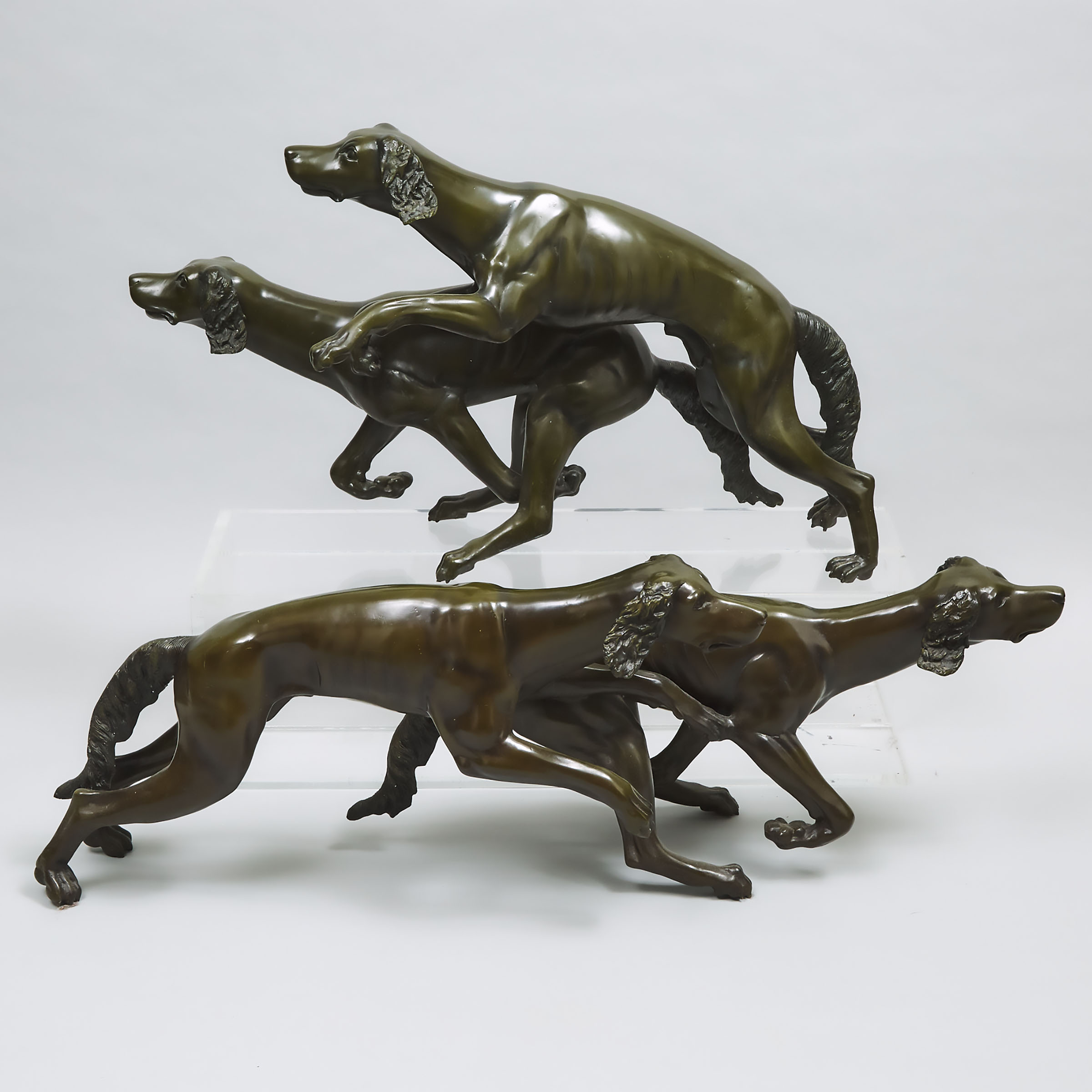 Two Bronze Patinated Metal Groups of Hounds in Pursuit, late 20th century