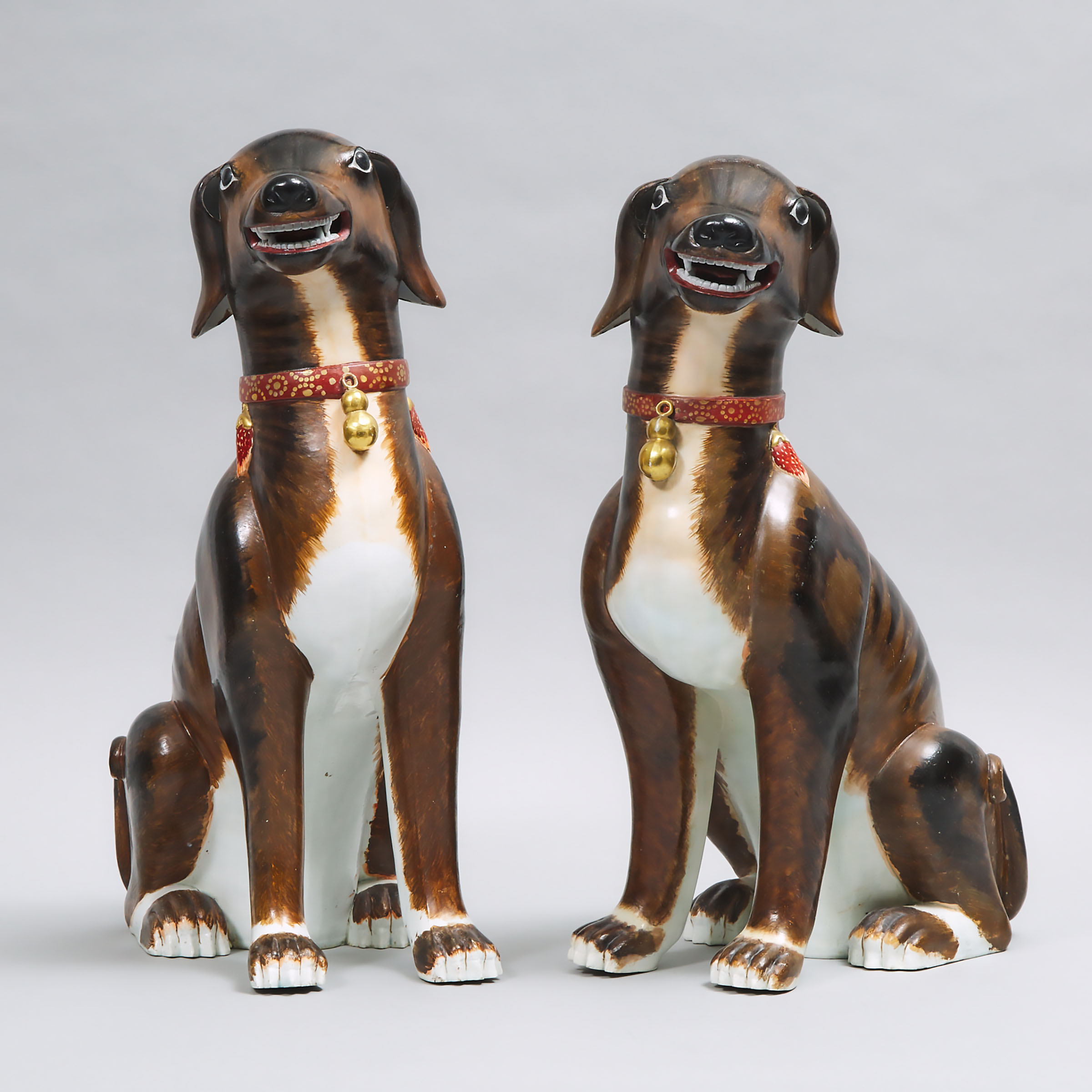Pair of Chinese Export Porcelain Large Models of Seated Hounds, 19th/20th century