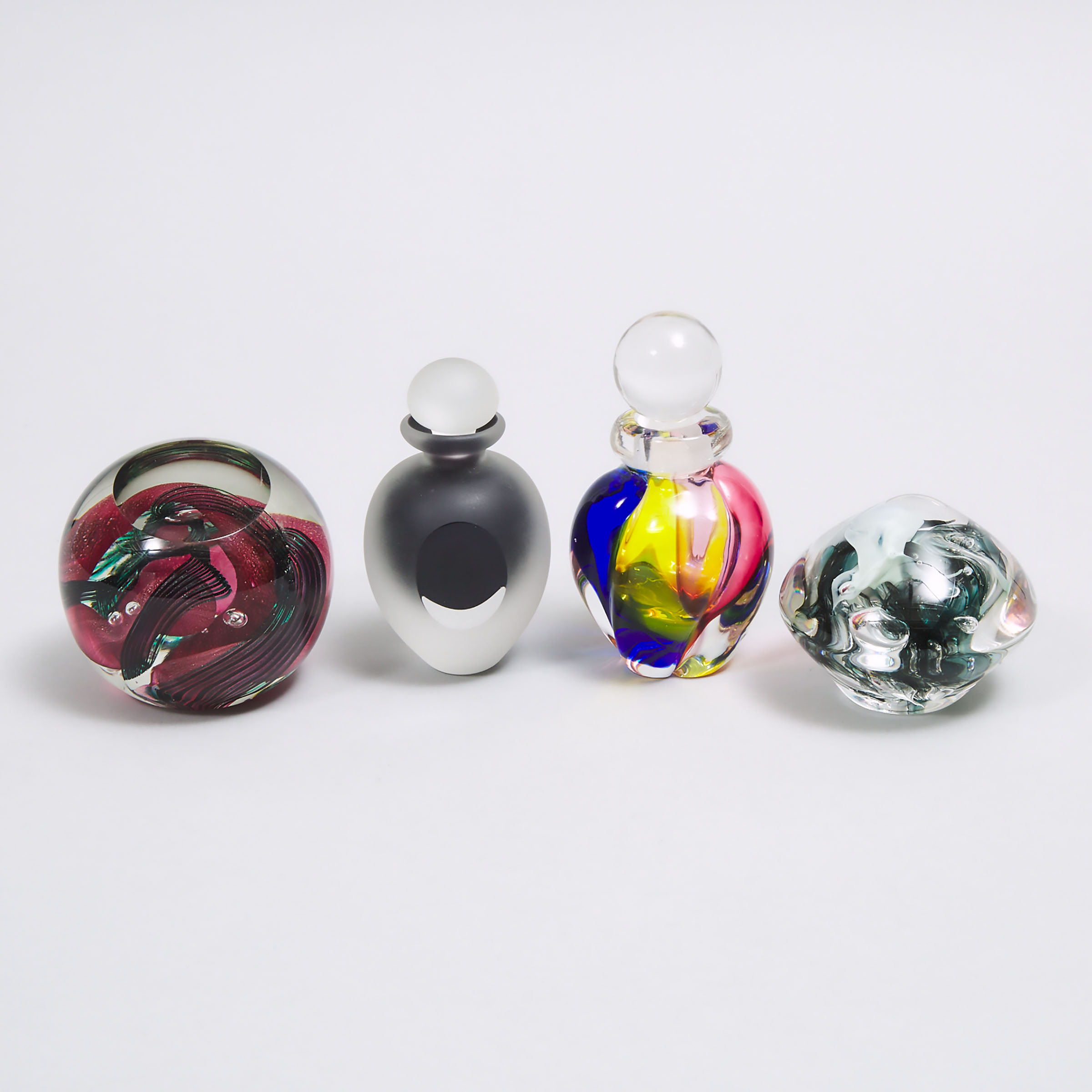 Two Studio Glass Paperweights and Two Perfume Bottles, late 20th century