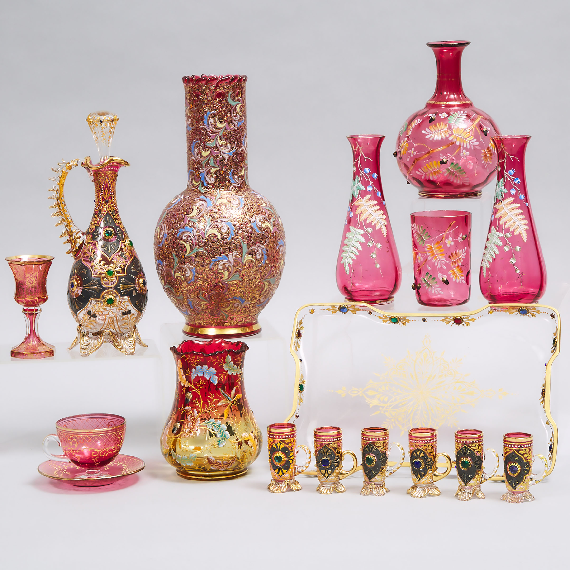 Group of Bohemian Enameled and Gilt Red Glass, late 19th century