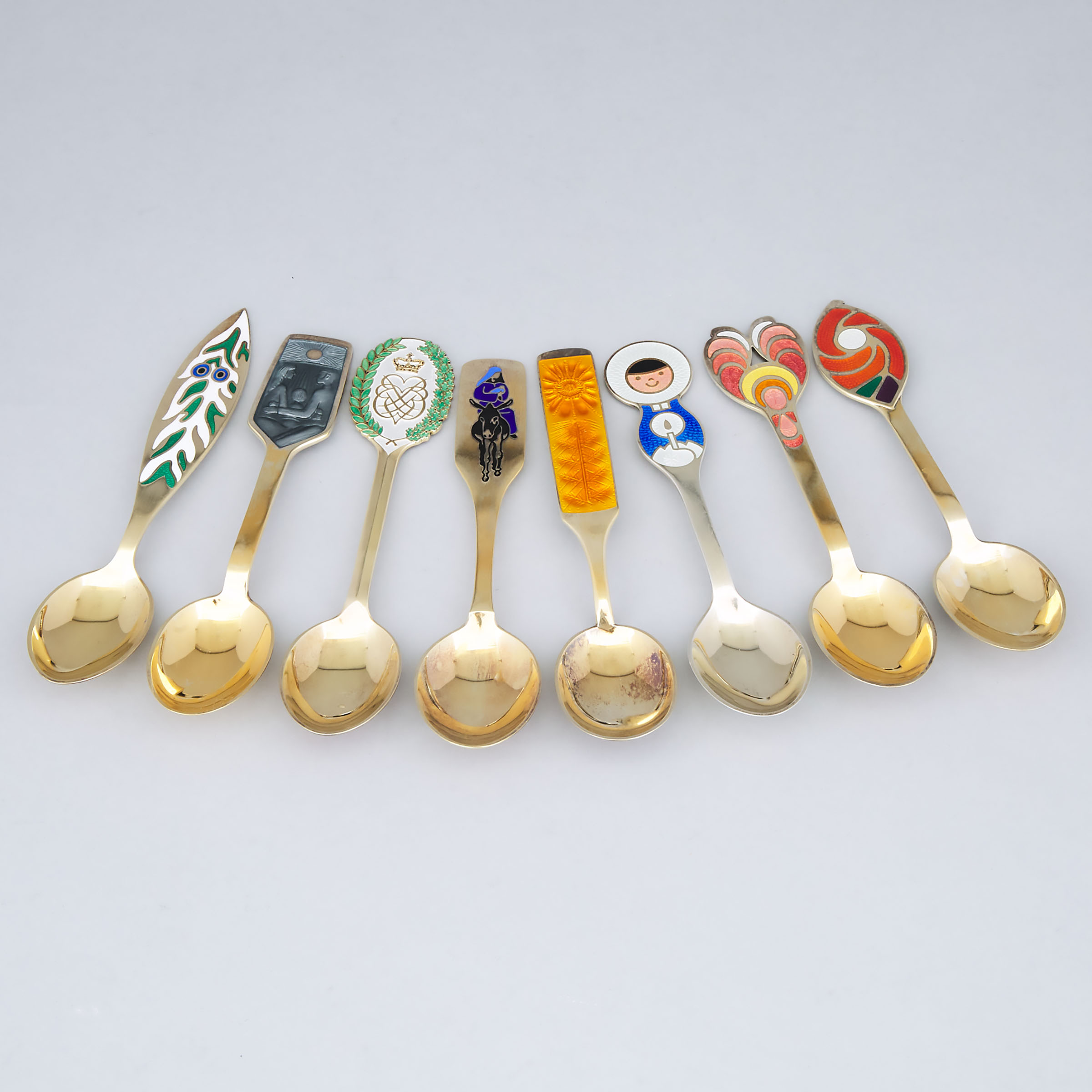 Eight Danish Enameled Silver-Gilt Spoons, Anton Michelsen, Copenhagen, 1966-73