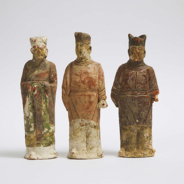 A Group of Twelve Chinese Painted Pottery Standing Figures, together with a Small Standing Figure and a Drum, Ming Dynasty, 15th Century