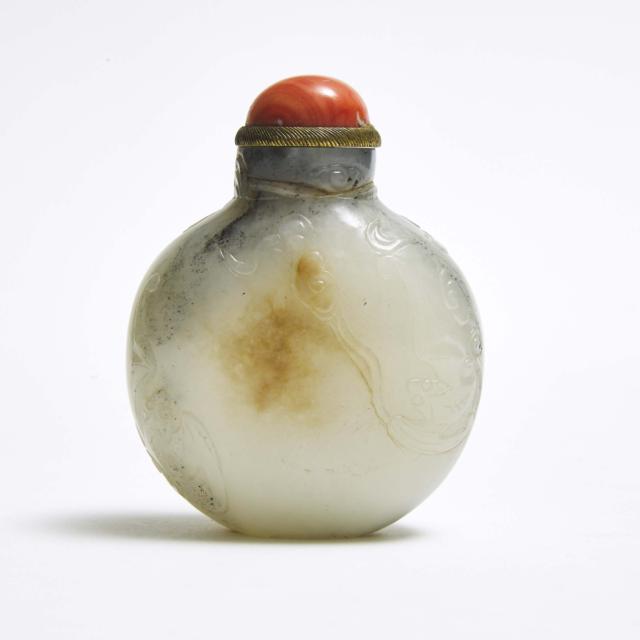 A Group of Three Carved Jade Snuff Bottles 