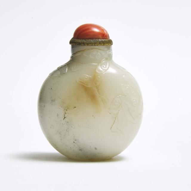 A Group of Three Carved Jade Snuff Bottles 