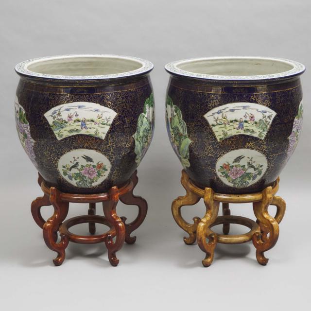 A Pair of Chinese Famille Rose Blue-Ground Fish Bowls on Stands, 20th Century